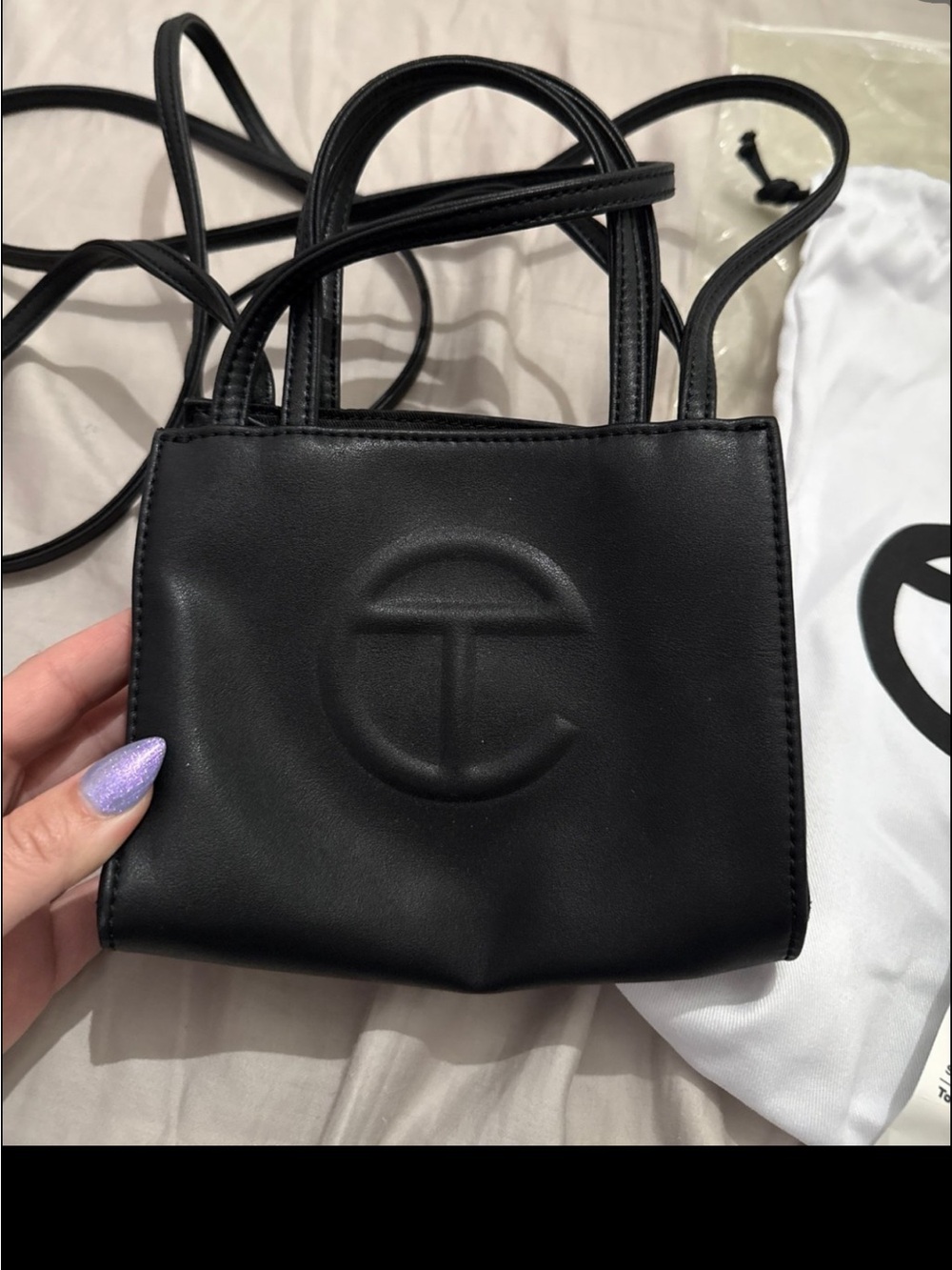 Black Mini small carry bag 
Telfar
Color - black